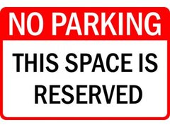 Sign no parking this space is reserved