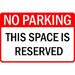 Sign no parking this space is reserved